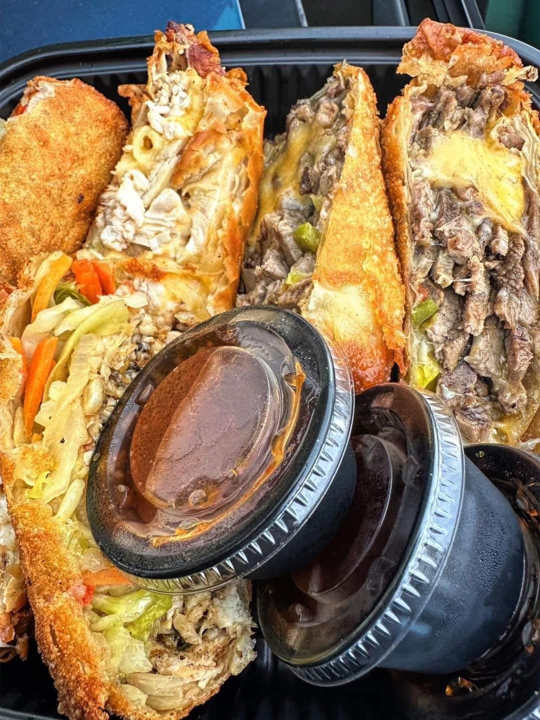 Golden crispy soul rolls with fillings and dipping sauces